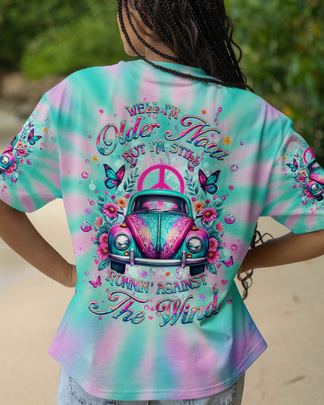 Well I_E2_80_99m Older Now but I_E2_80_99m Still Runnin_E2_80_99 Against the Wind Retro Car Tie Dye Design for Women AOP Shirts _1_ catTY